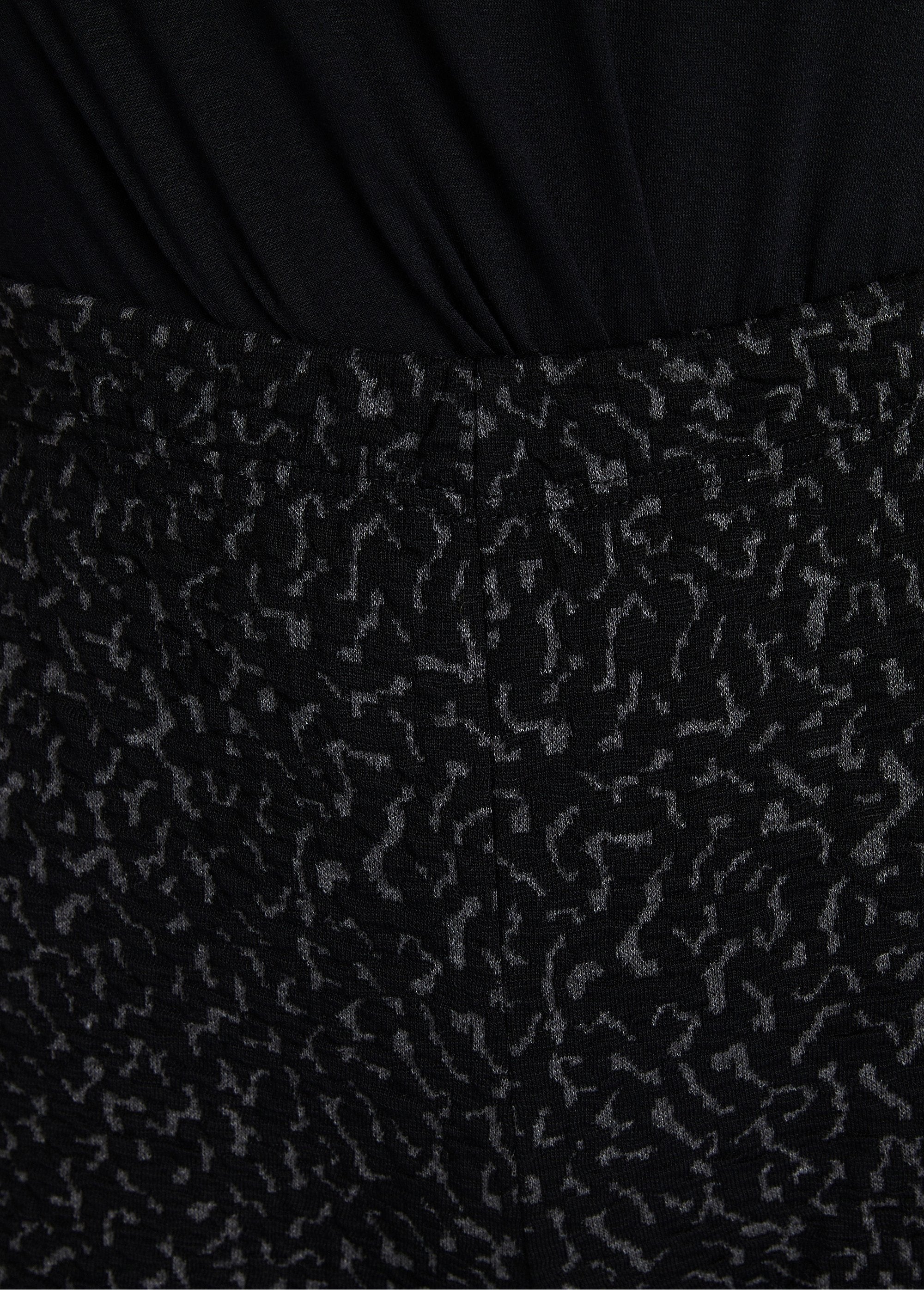 Leggings_elásticos_lisos_o_bicolores_con_cintura_elástica_gris_y_negro_DE1_slim