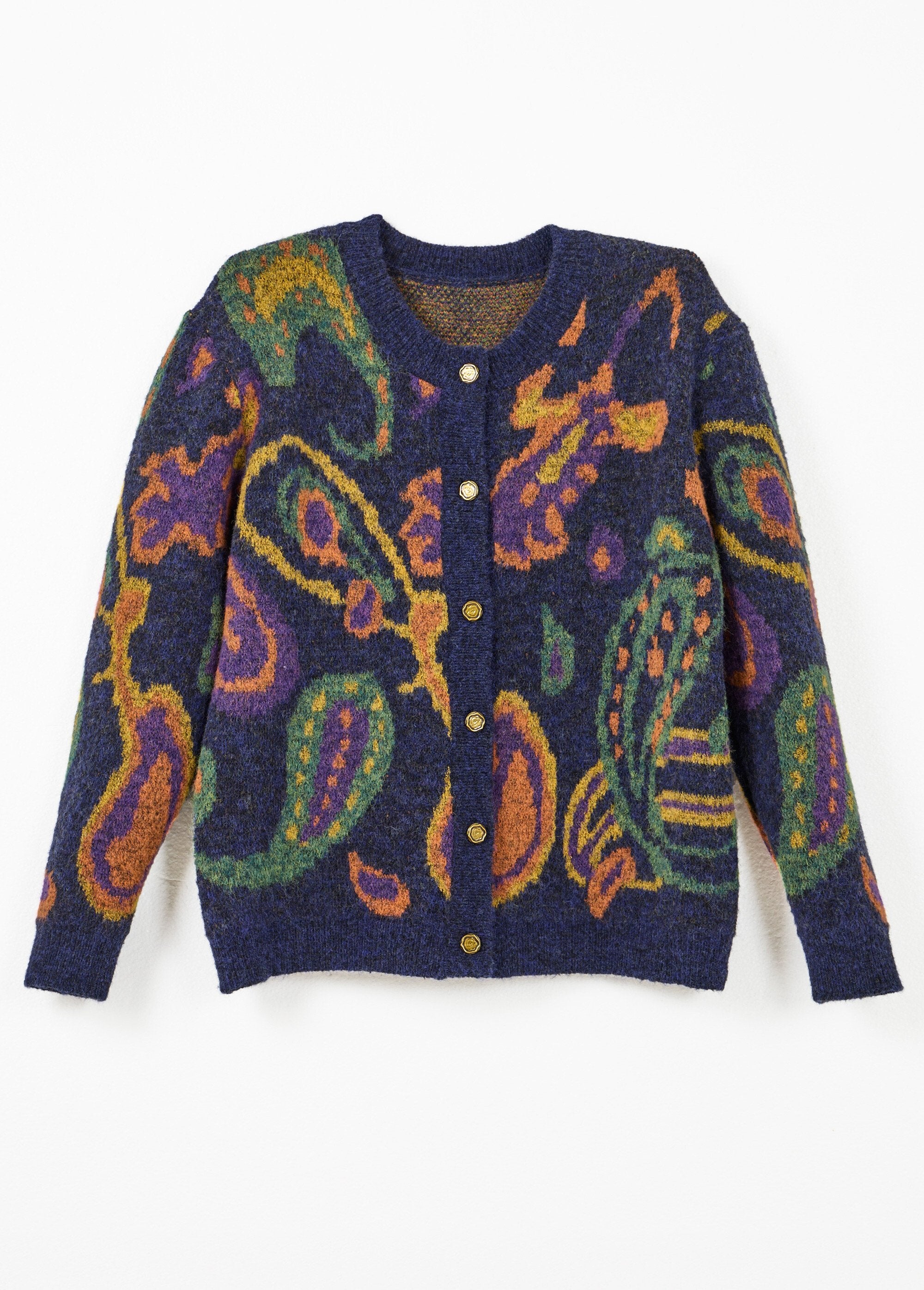 Cálido_cárdigan_corto_de_jacquard_con_botones_y_lana_fondo_marino_AP1_slim