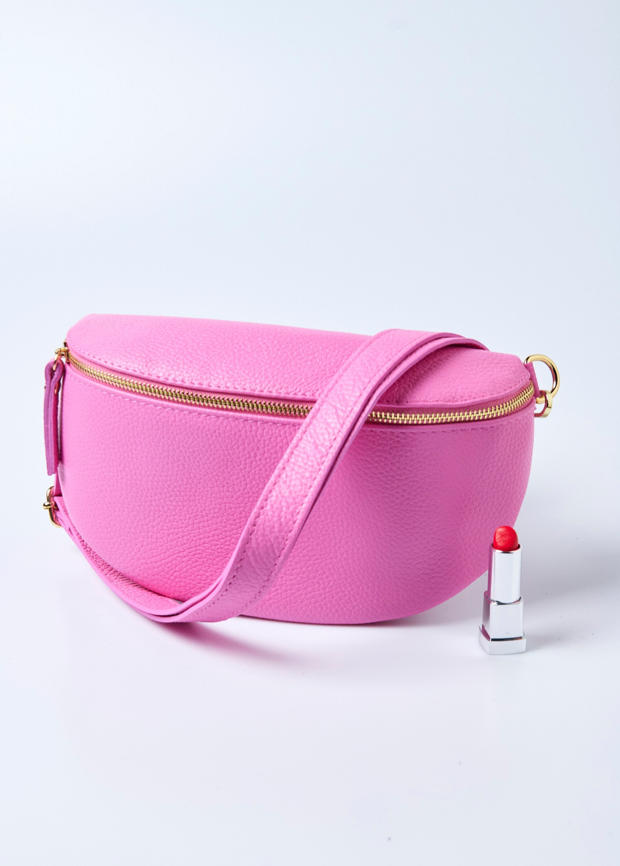 Riñonera_de_cuero_con_cremallera_y_correa_para_el_hombro_Rosa_caliente_FA1_slim