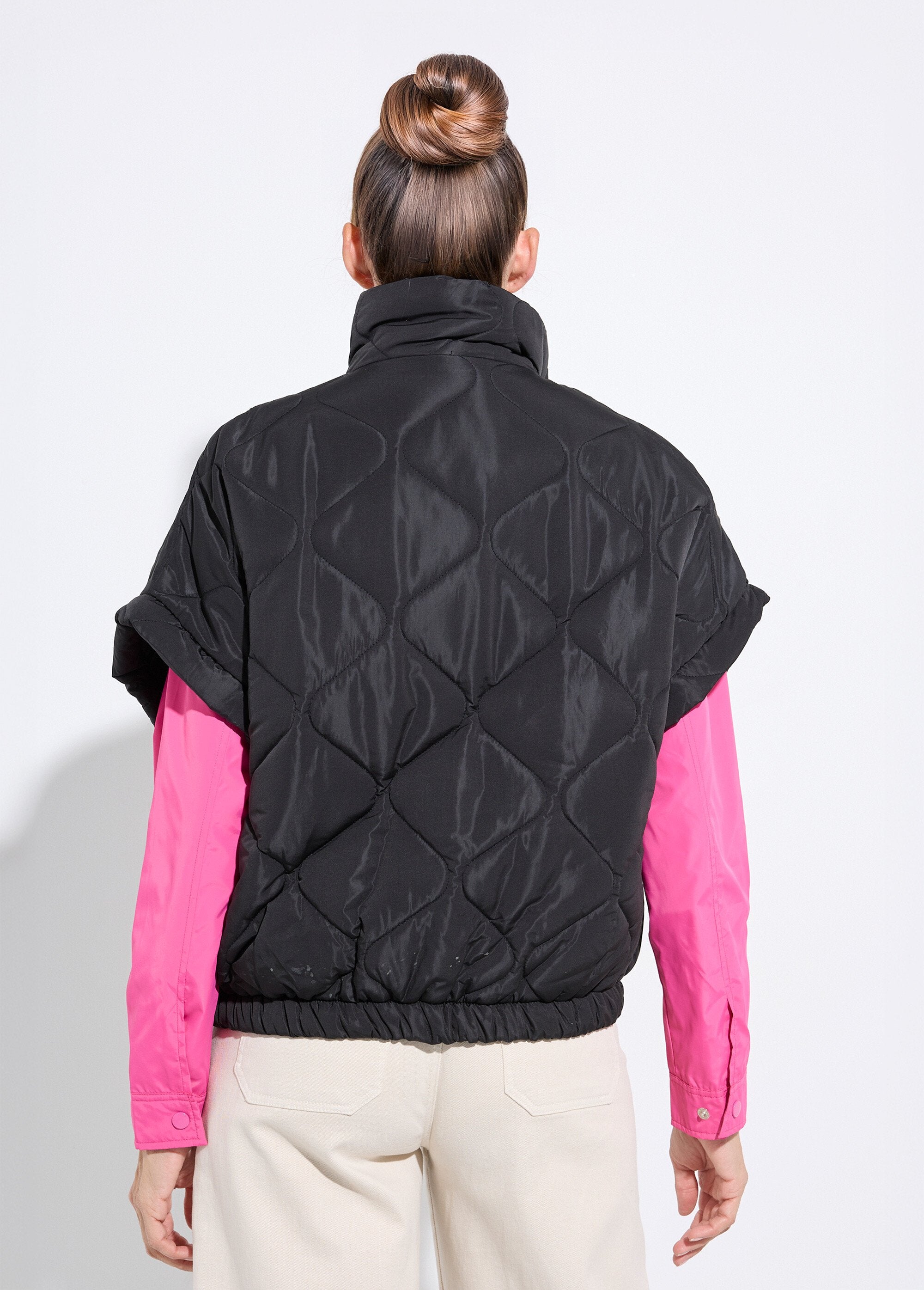 Chaqueta_de_plumas_mate_sin_mangas_con_cremallera_fluorescente_Negro_DO1_slim
