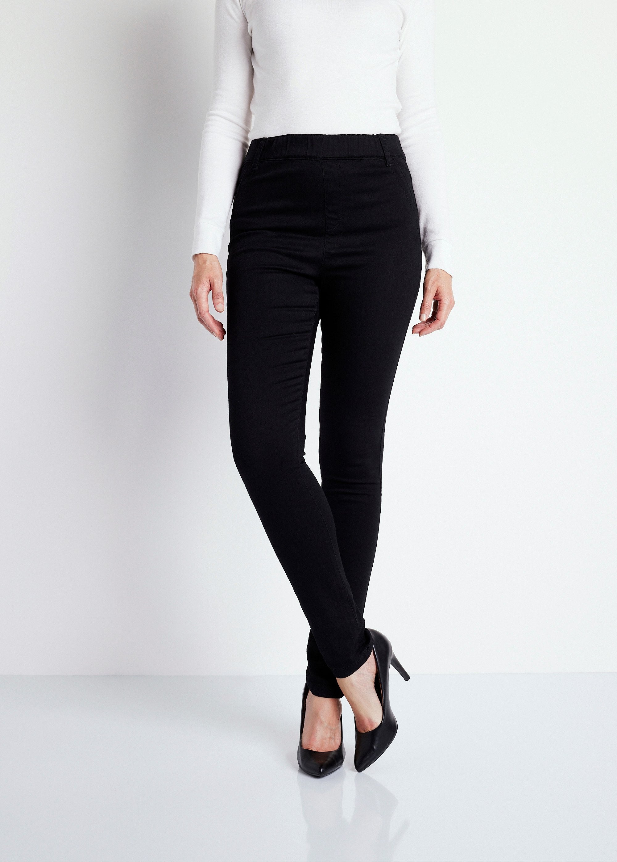 Pantalón_jegging_de_denim_elástico_con_vientre_plano_Negro_FA1_slim